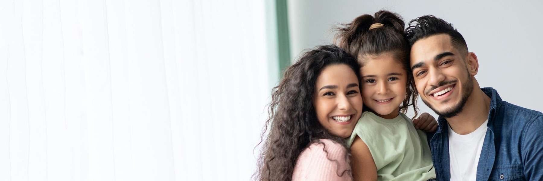 A young family that trusts family dentistry at Bass & Watson Family Dental