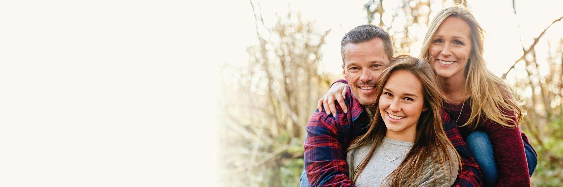 family smiling | family dentist apex, NC