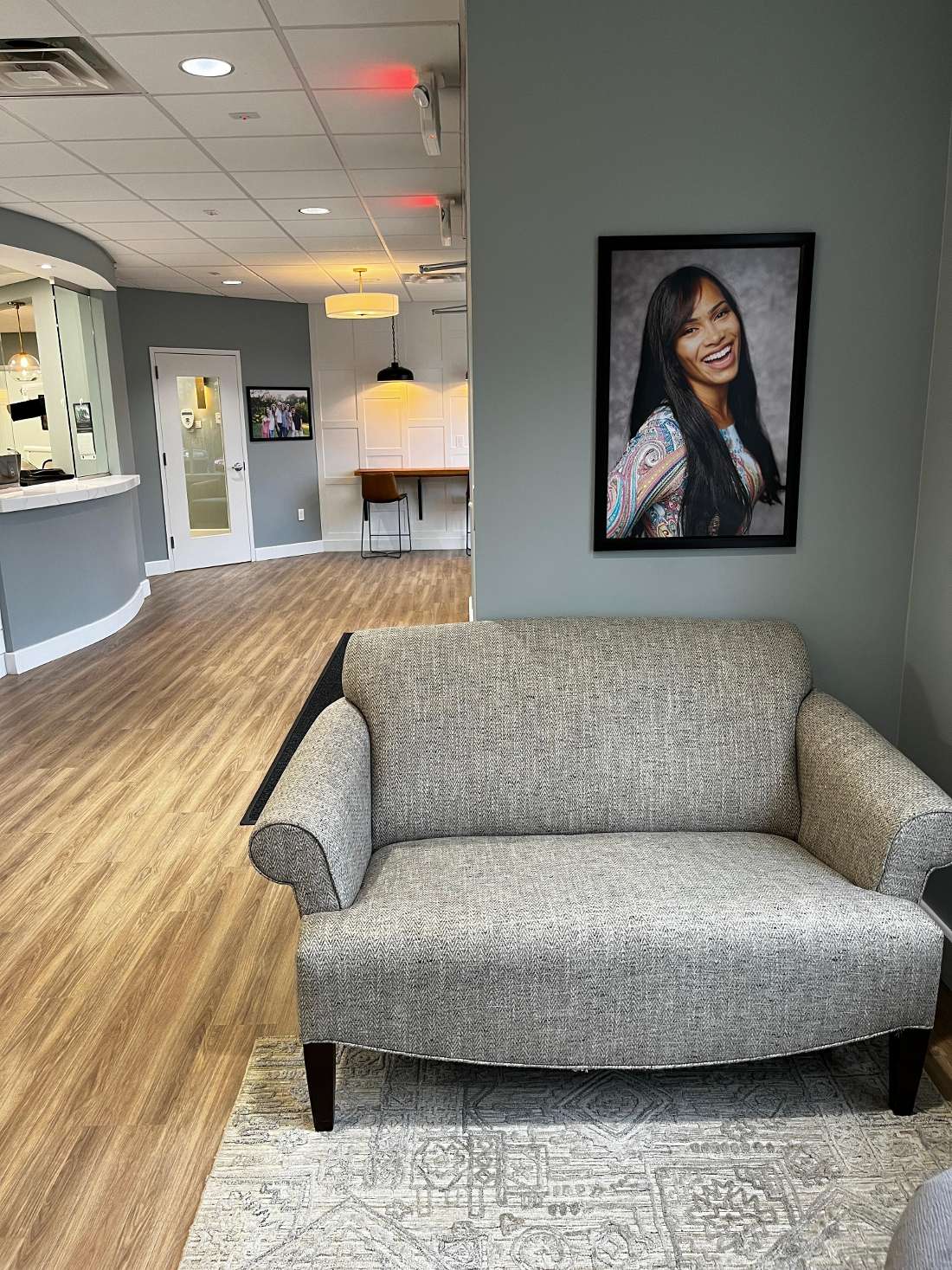 Apex dental office lobby with gray chair 