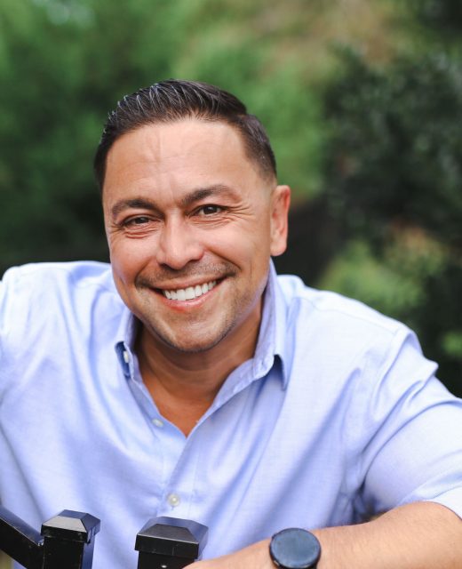 Man smiling outdoors