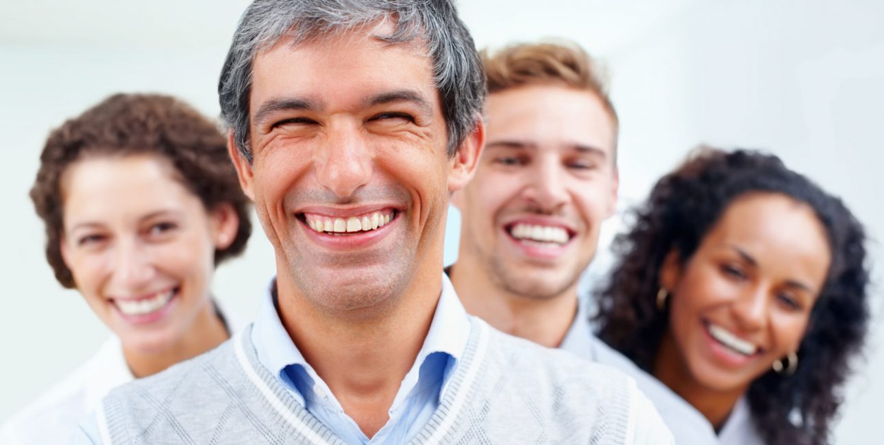 Group of adults smiling together